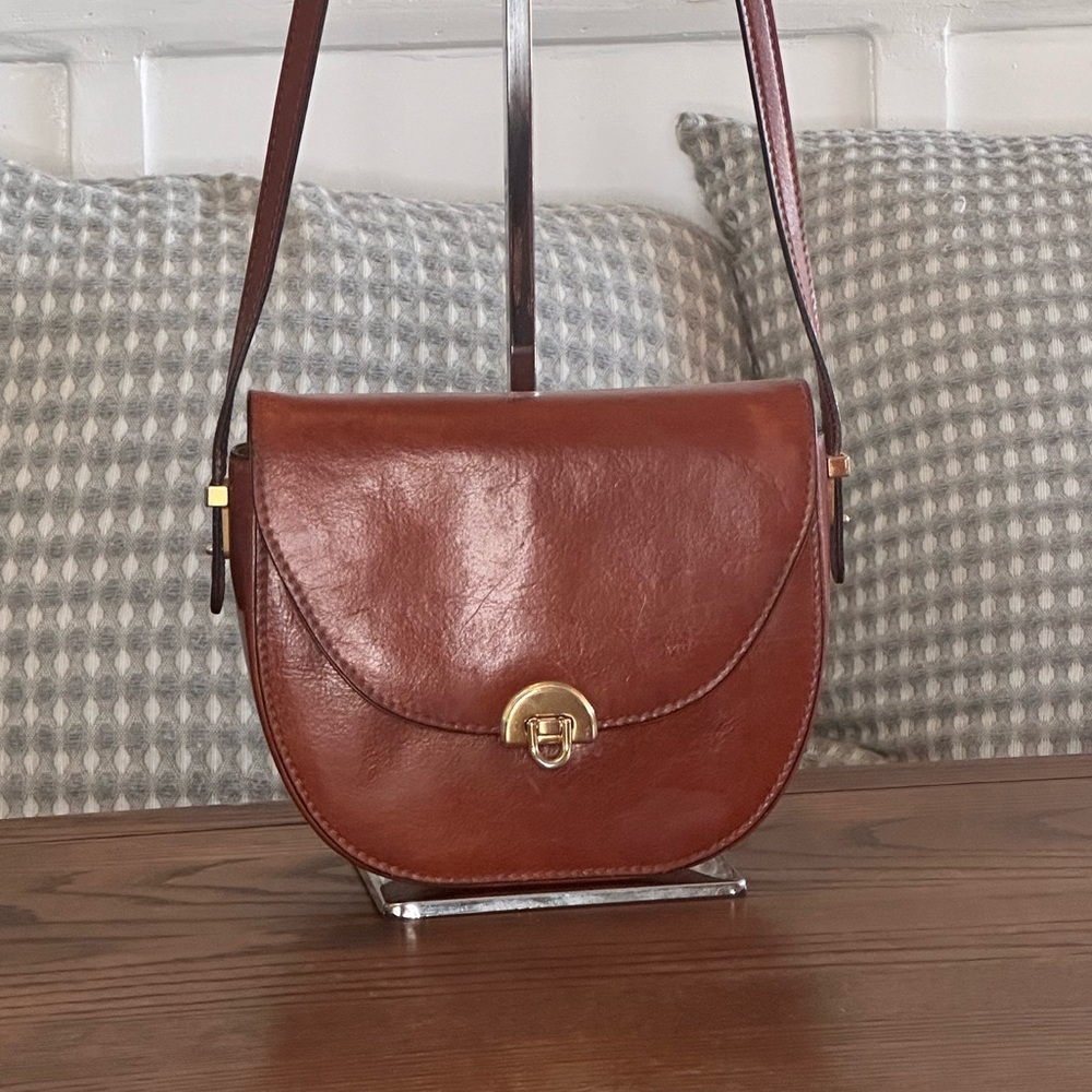 CARRY-ON Brand cross body saddle bag. Made in Italy…Sold at Nobu Hotel